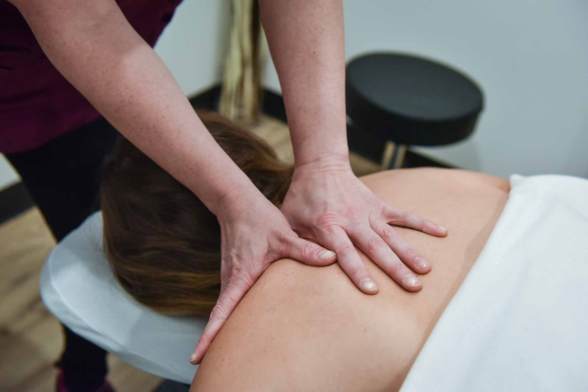 Jessica Koch with Patient | Complete Health | Chiropractic & Wellness Center | SW Calgary